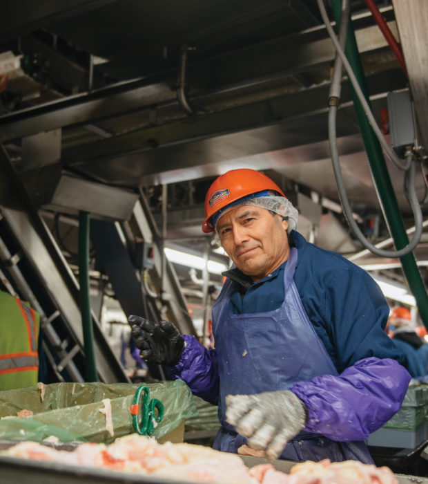 older guy processing food