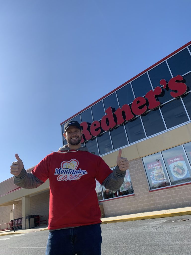 Community Relations Manager Zach Evans outside of Redner’s during the annual Thanksgiving for Thousands food drive.